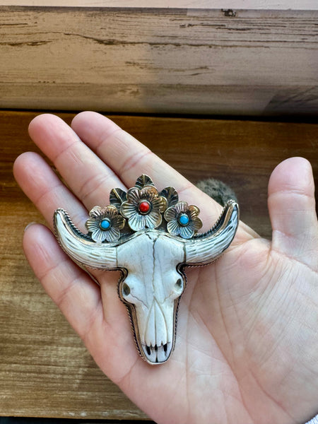 Big Antler longhorn with  turquoise pendant with color flowers