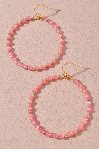 Pink beaded hoop earrings
